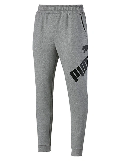 Shop Puma Graphic Logo Sweatpants In Grey