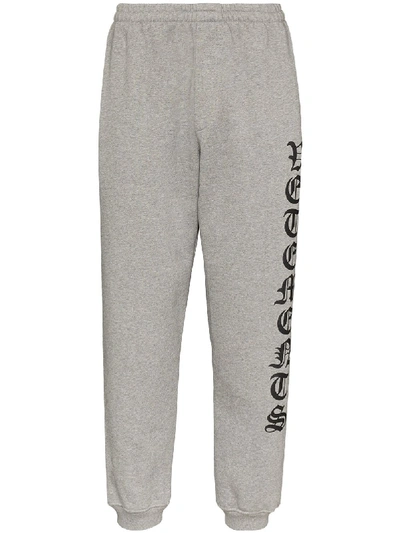 Shop Vetements Gothic Logo Track Pants In Grey