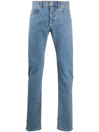Shop Versace Logo Patch Slim-fit Jeans In Blue