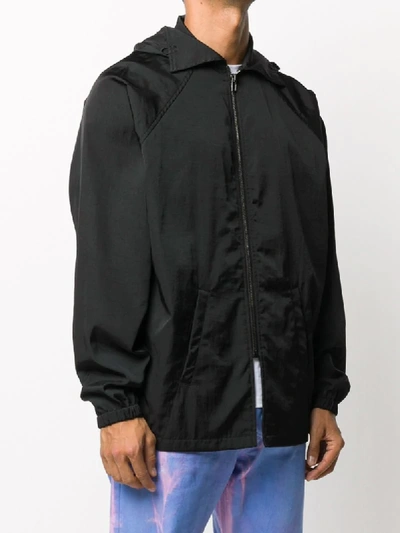 Moschino Logo Print Windbreaker In Black