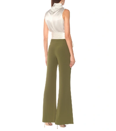 Shop Galvan High-rise Crêpe Flared Pants In Green