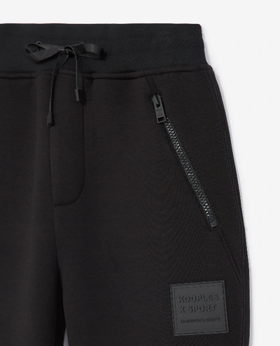 Shop The Kooples Sport Zipped Skinny Black Joggers With Logo Patch