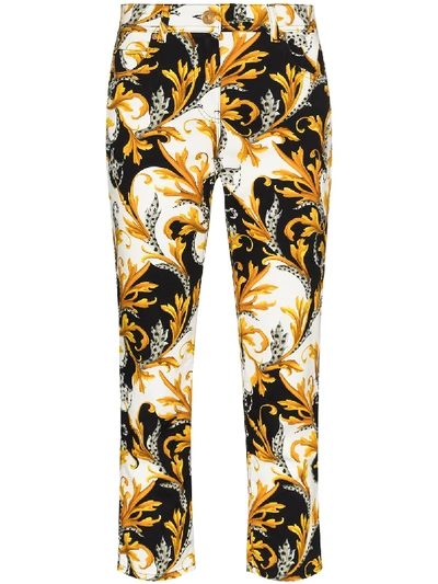 Shop Versace Cropped-jeans Mit Barock-print In White