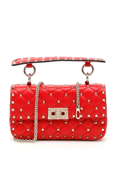 Shop Valentino Small Leather Rockstud Spike Bag In Red