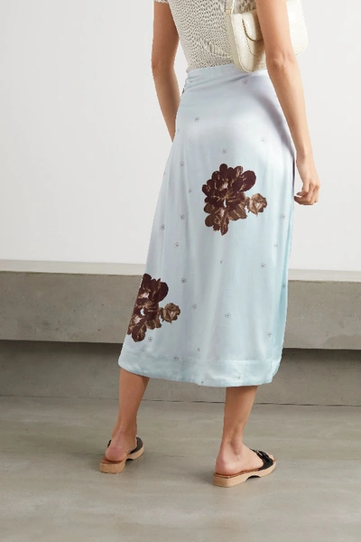 Shop Ganni Floral-print Ruched Satin Midi Skirt In Light Blue