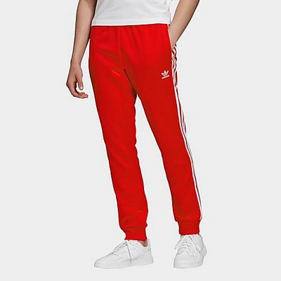 Shop Adidas Originals Adidas Men's Classics Adicolor Primeblue Sst Track Pants In Scarlet/white