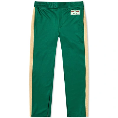 Shop Gucci Technical Jersey Gg Track Pant In Green