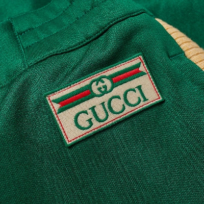 Shop Gucci Technical Jersey Gg Track Pant In Green