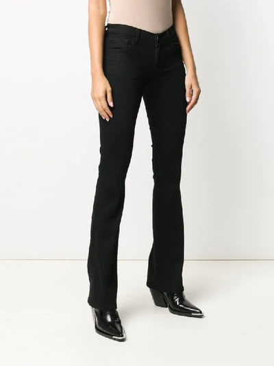Shop J Brand Sallie Mid-rise Bootcut Jeans In Black