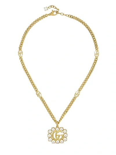 Shop Gucci Pearl-embellished Double G Charm Necklace In Gold