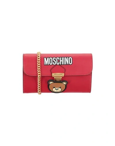 Shop Moschino Wallets In Red