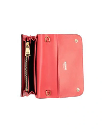 Shop Moschino Wallets In Red