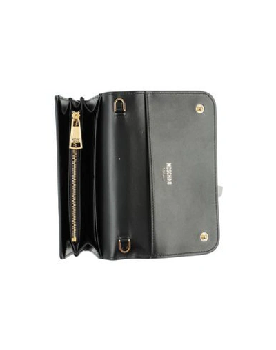 Shop Moschino Wallet In Black