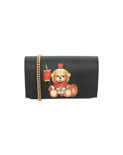 Shop Moschino Wallets In Black
