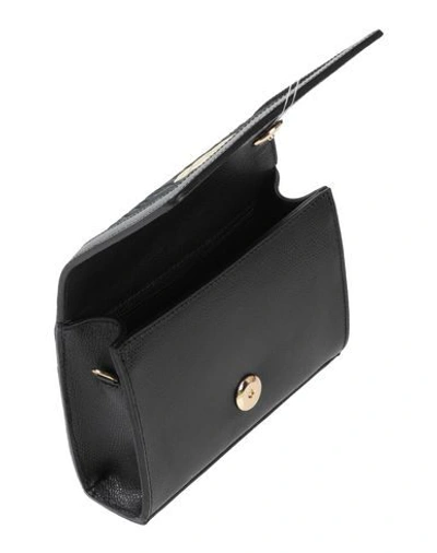 Shop Gcds Handbags In Black