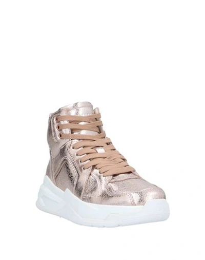 Shop Balmain Sneakers In Copper