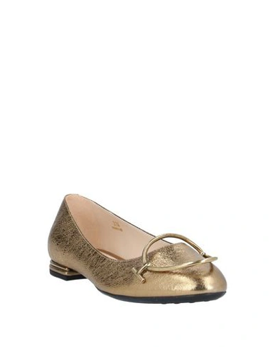 Tod's Ballet Flats In Gold