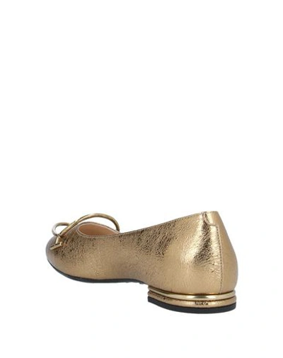 Tod's Ballet Flats In Gold