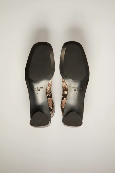Shop Acne Studios Python Leather Boots Beige/black