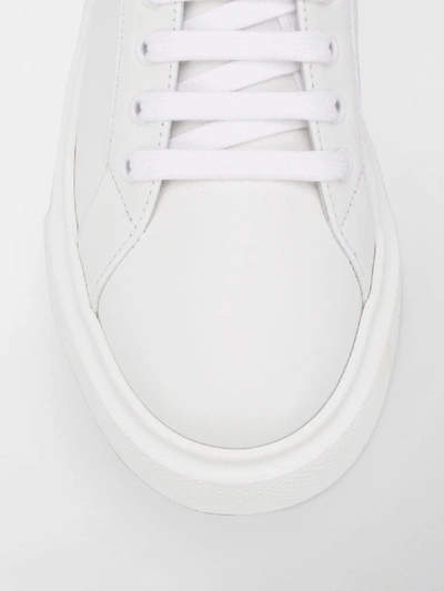 Shop Prada Leather Sneakers In White