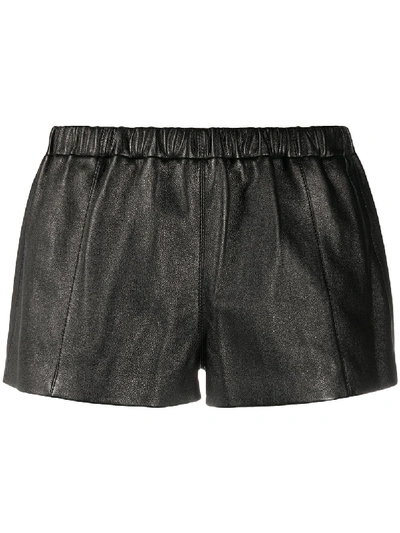 Shop Saint Laurent Leather Short Shorts In Black