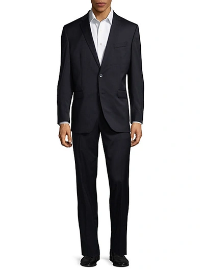 Shop Kenneth Cole Slim-fit Solid Wool-blend Stretch Suit