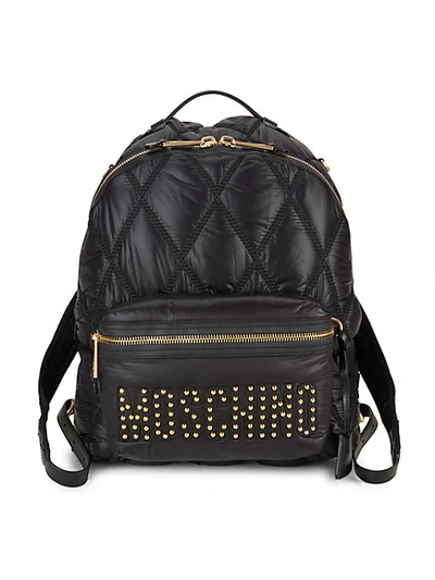 Shop Moschino Studded Logo Quilted Backpack