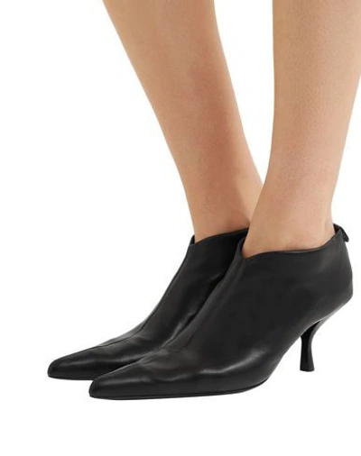 Shop The Row Booties In Black