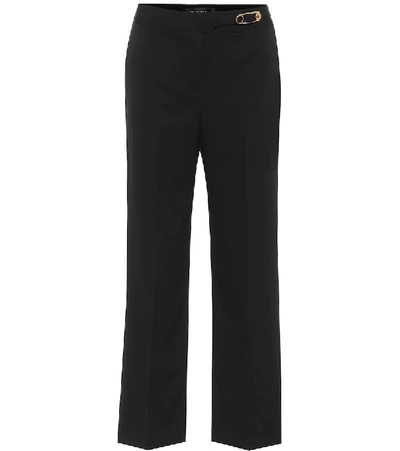 Shop Versace Embellished Stretch-wool Pants In Black