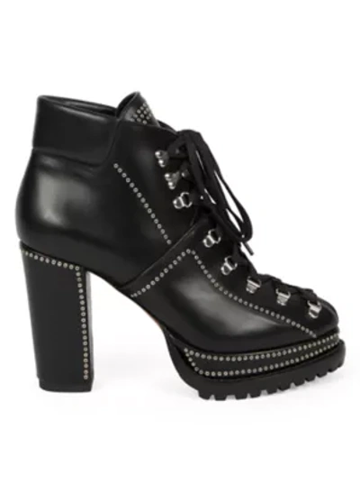 Shop Alaïa Grommet Leather Platform Combat Boots In Noir
