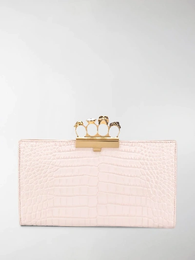 Shop Alexander Mcqueen Skull Four-ring Clutch Bag In Pink