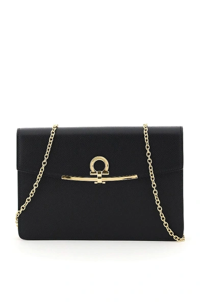 Shop Ferragamo Firenze Clutch With Sf Monogram In Black