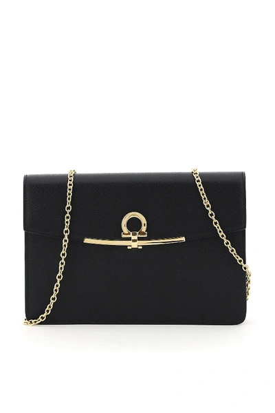 Shop Ferragamo Gancini Clutch In Black