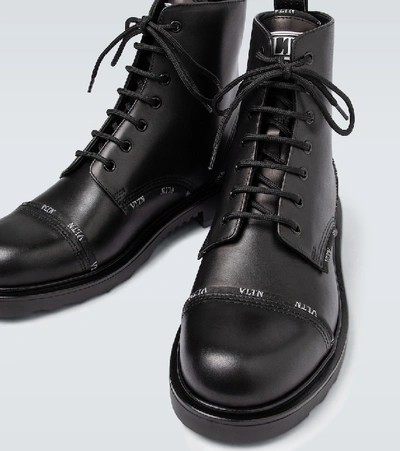 Shop Valentino Garavani Vltn Band Combat Boots In Black