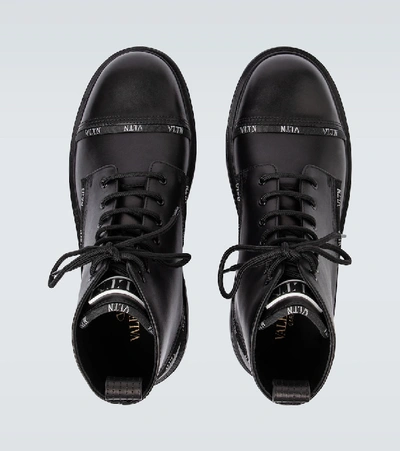 Shop Valentino Garavani Vltn Band Combat Boots In Black