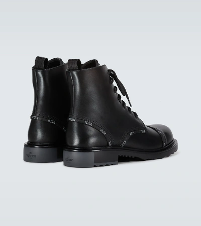 Shop Valentino Garavani Vltn Band Combat Boots In Black