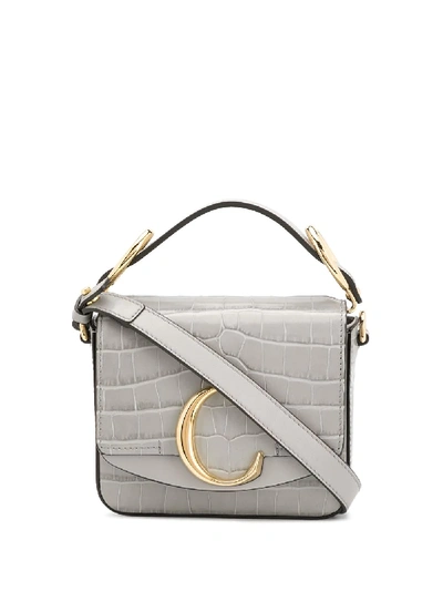 Shop Chloé Mini C Top Handle Bag In Grey