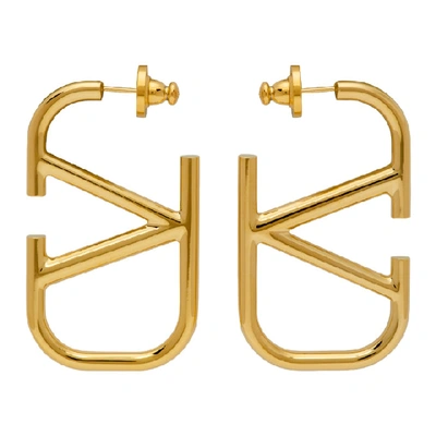 Shop Valentino Gold  Garavani Vlogo Hoop Earrings In Cs4 Gold