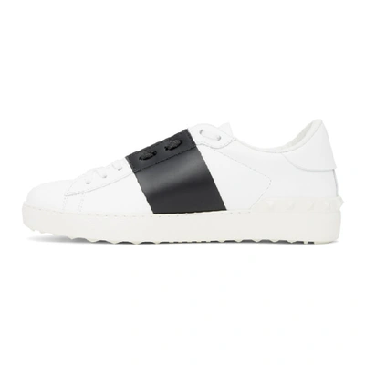 Shop Valentino White & Black  Garavani Rockstud Open Sneakers In A01 Bianco/