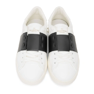 Shop Valentino White & Black  Garavani Rockstud Open Sneakers In A01 Bianco/