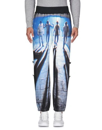 Shop Undercover Casual Pants In Blue