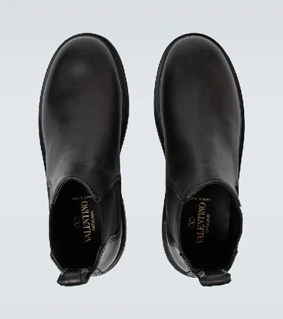 Shop Valentino Vltn Beatle Leather Boots In Black