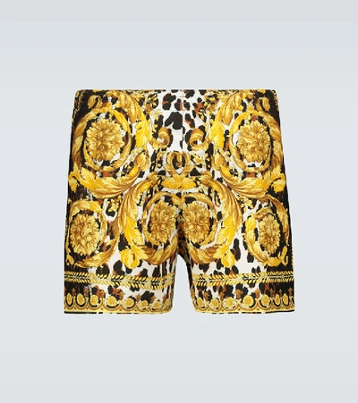 Shop Versace Baroque Printed Swim Shorts In Gold