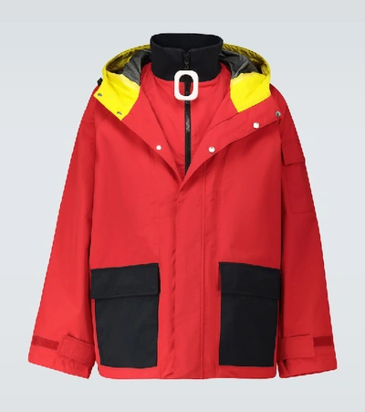 Shop Jw Anderson Jwa Puller Nylon Hooded Jacket In Red