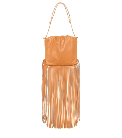 Shop Bottega Veneta Fringe Pouch Leather Bag In Orange