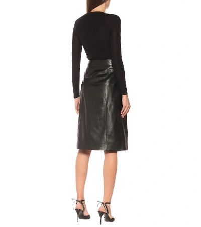 Shop Saint Laurent Leather Midi Skirt In Black