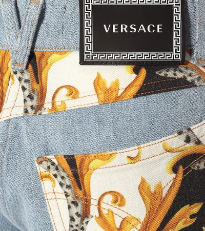 Shop Versace High-rise Stretch-denim Shorts In Blue