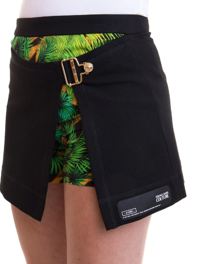 Shop Versace Jeans Couture Jungle Print Skirt Effect Shorts In Black