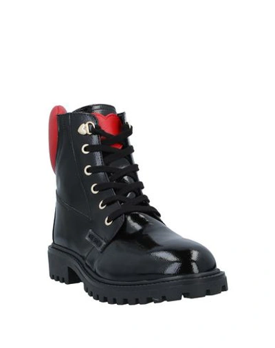 Shop Love Moschino Ankle Boots In Black