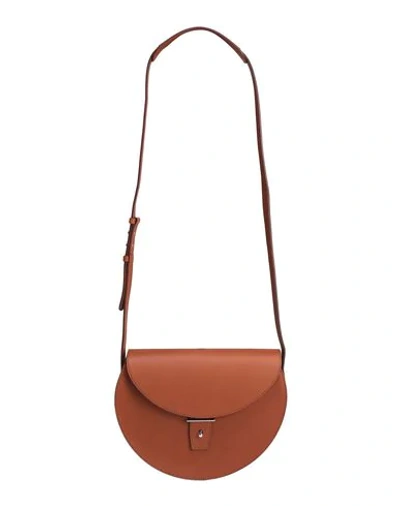 Shop Pb 0110 0110 Handbags In Tan